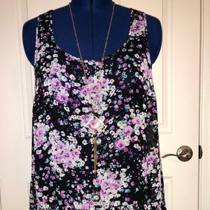 Sheer floral print tunic.